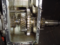  then have to release circlip (shown to the left) and slide everything off the shaft as its drawn out rearwards (right)